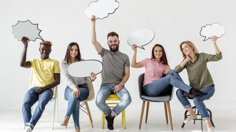 low-angle-friends-chairs-with-chat-bubbles