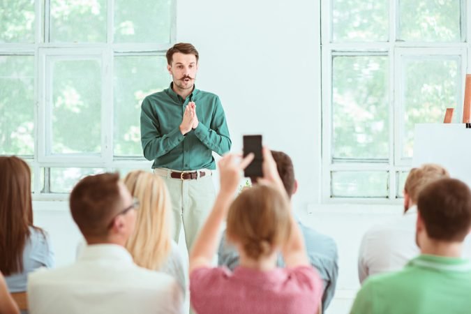 Speaker at Business Meeting in the conference hall. Business and Entrepreneurship concept.